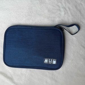 Cord holder for travel or organizing. Holds multiple chargers. NWOT.